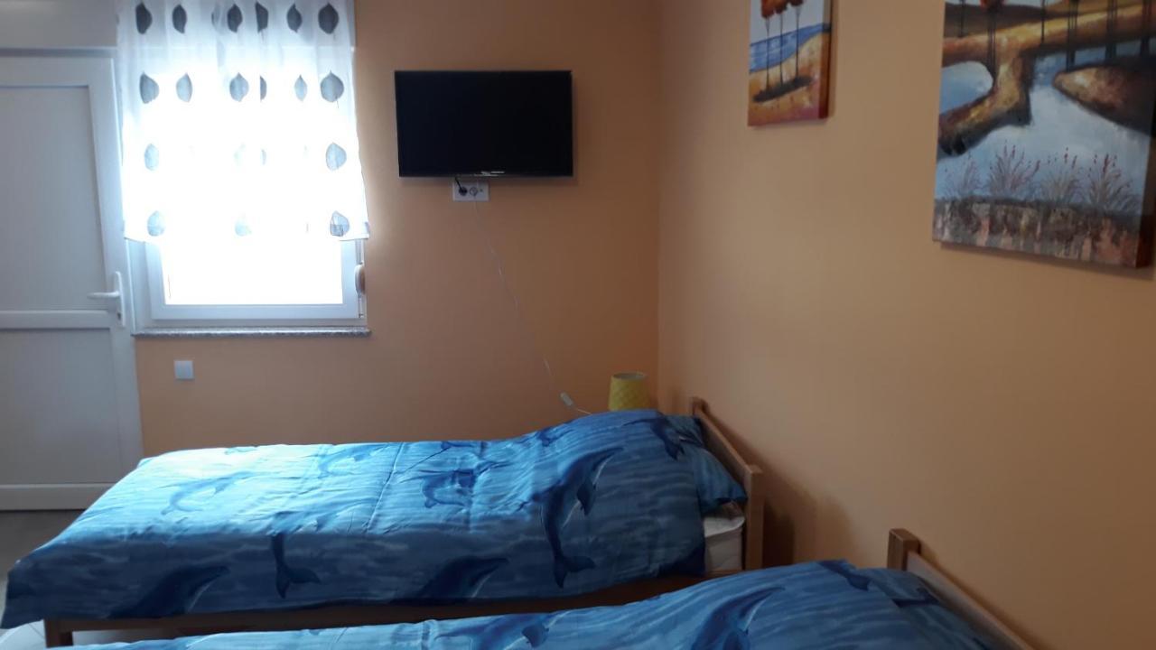 Andi Apartman Pacir Esterno foto